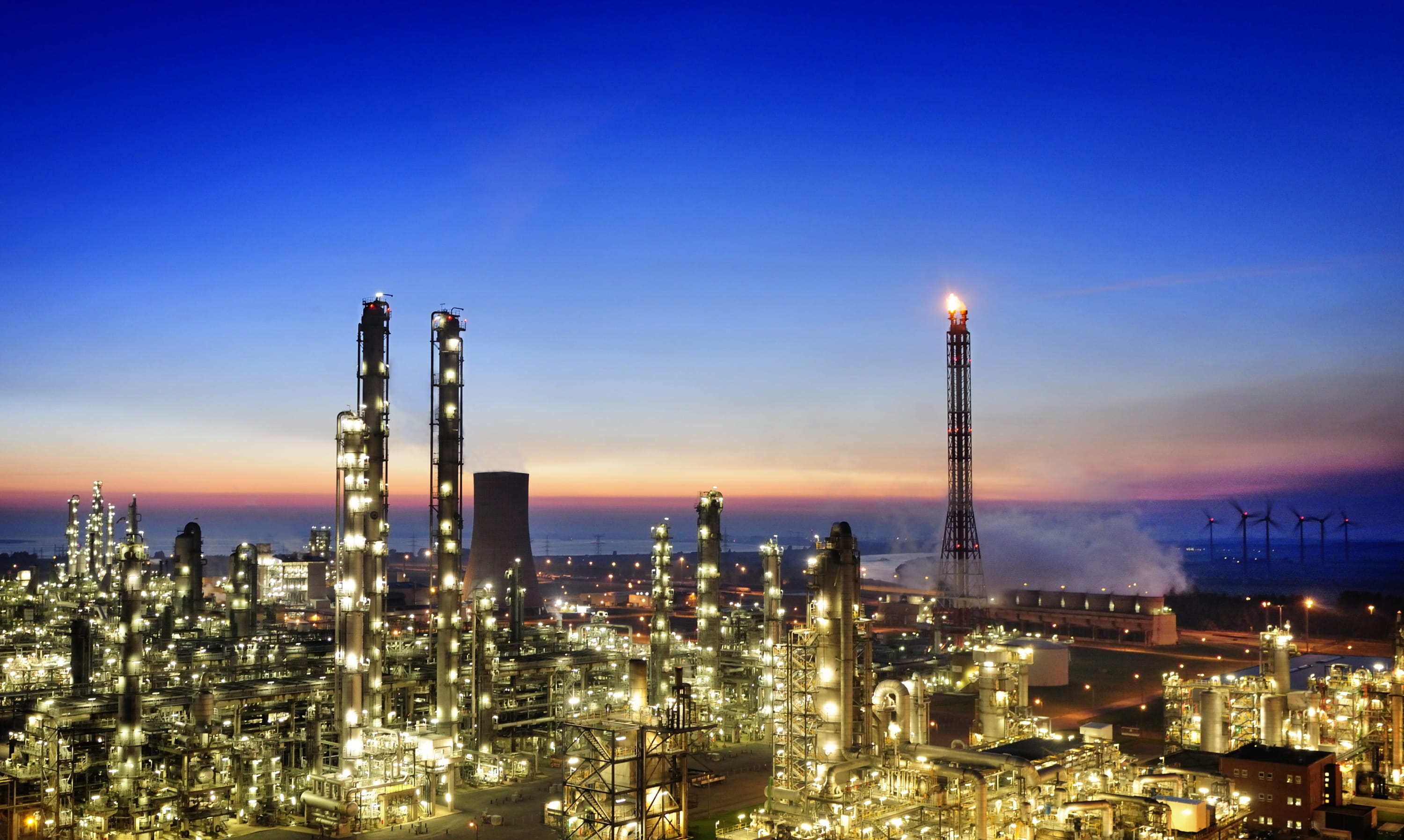 Blue-hour corporate photograph of the BASF Antwerp site, shot by Michel Wiegandt